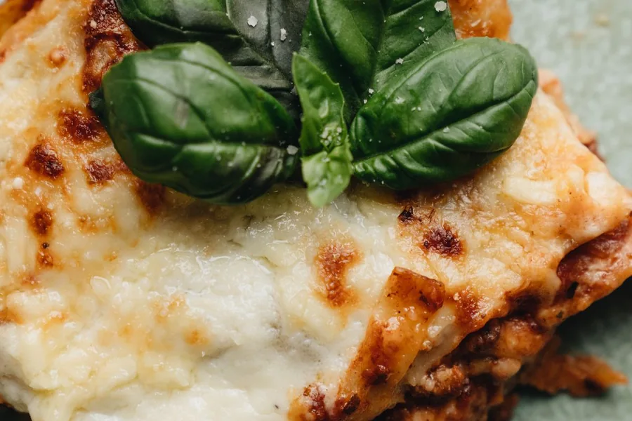 Cheesy layered lasagna — representative food photograph