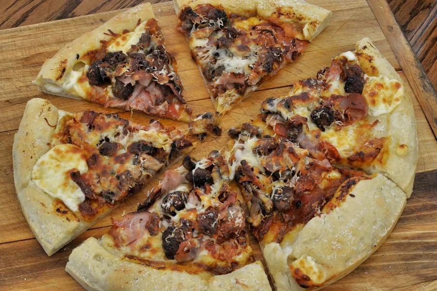 Mmm... meat lover's pizza — representative food photograph